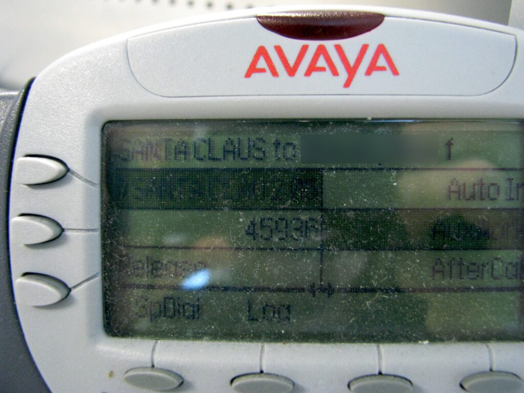 A photo of a call centre phone saying I have an incoming call from Santa Claus.